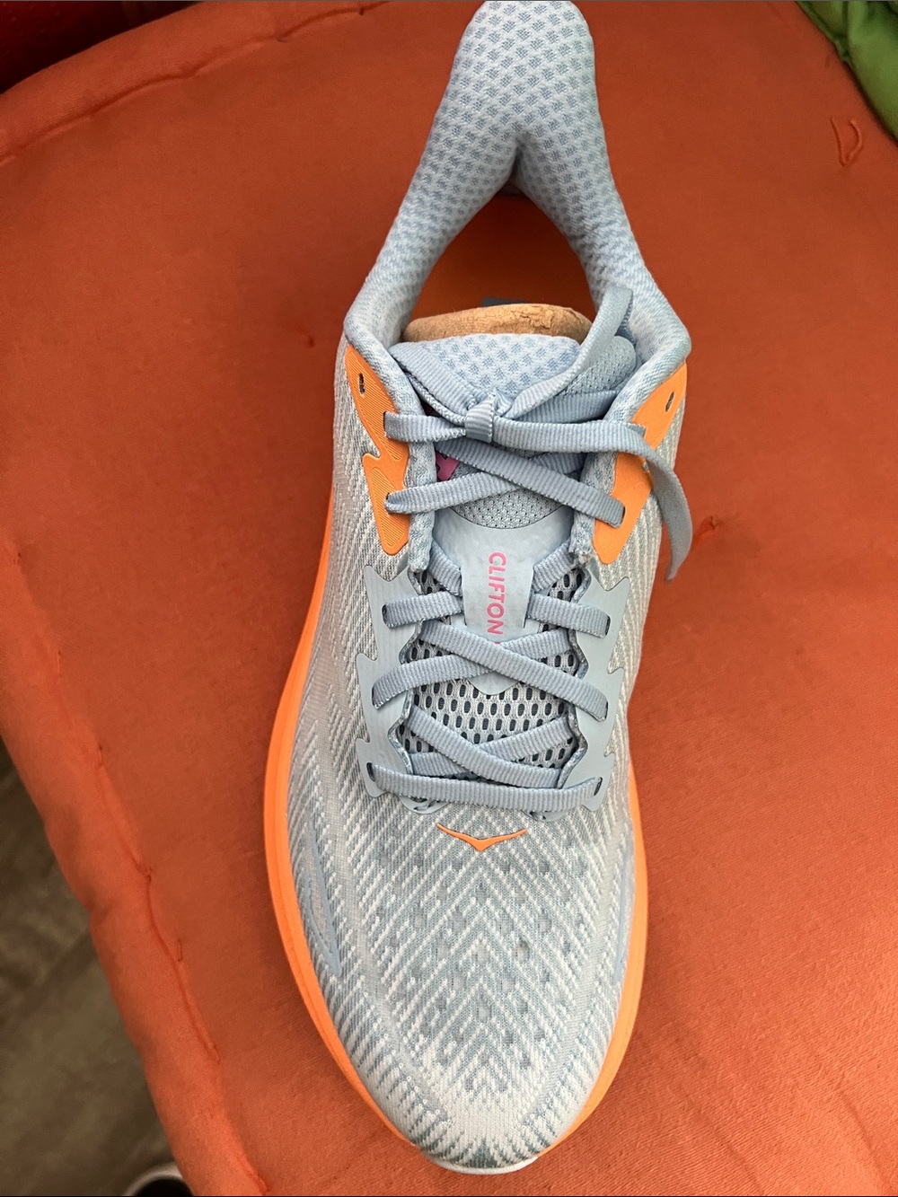 Hoka Clifton Women's Running Shoe - Light Blue with Orange Accents